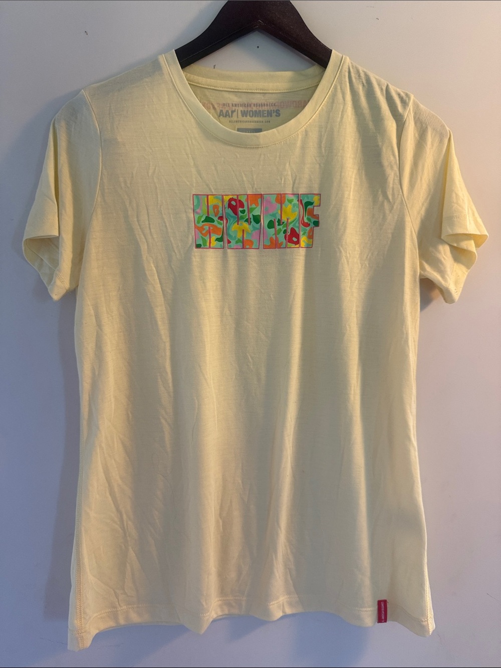All American Roughneck Women's Light Yellow “HWMF” Graphic Workout Tee Sz L EUC